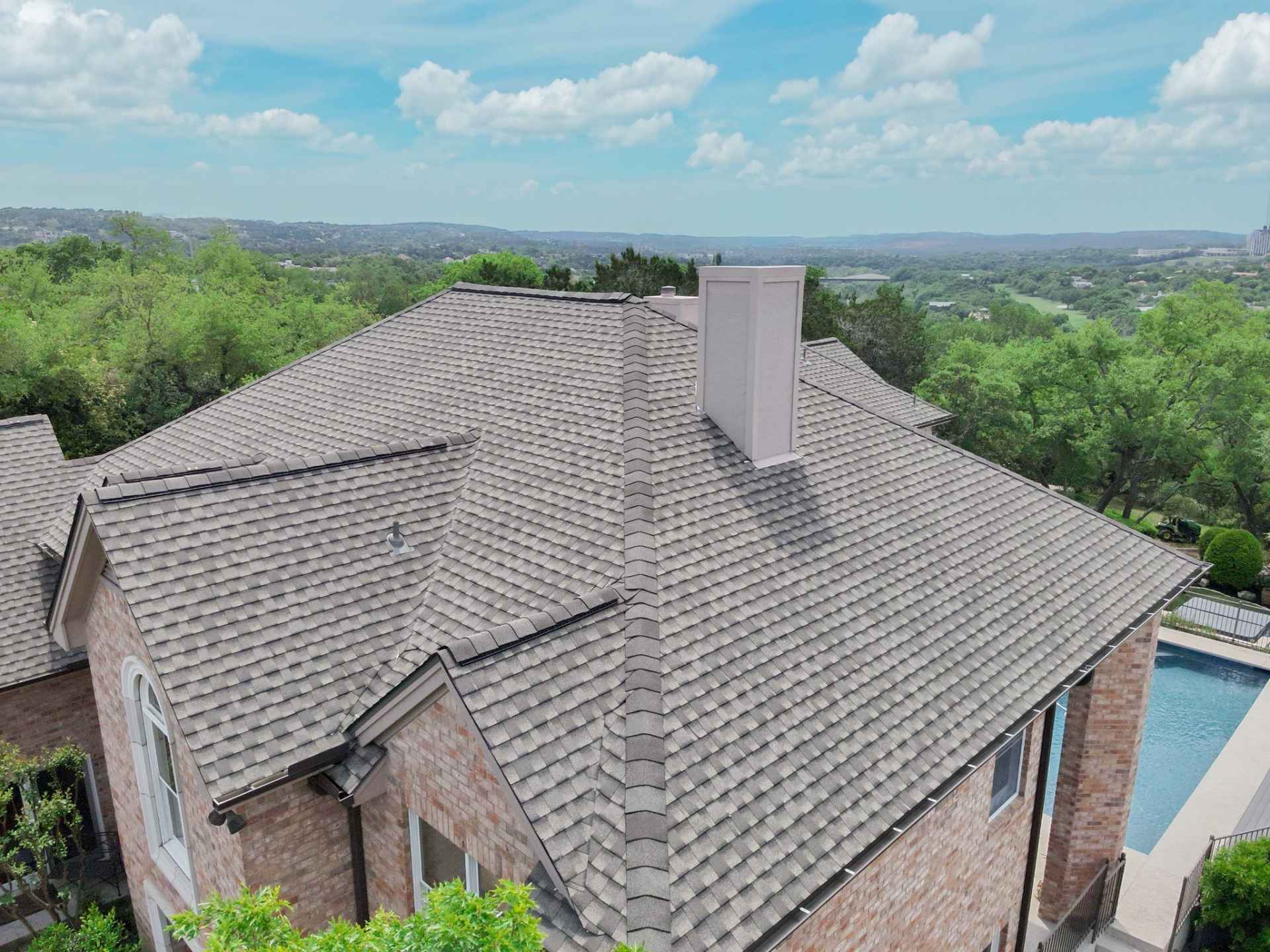 Aerial view of a gray shingle roof